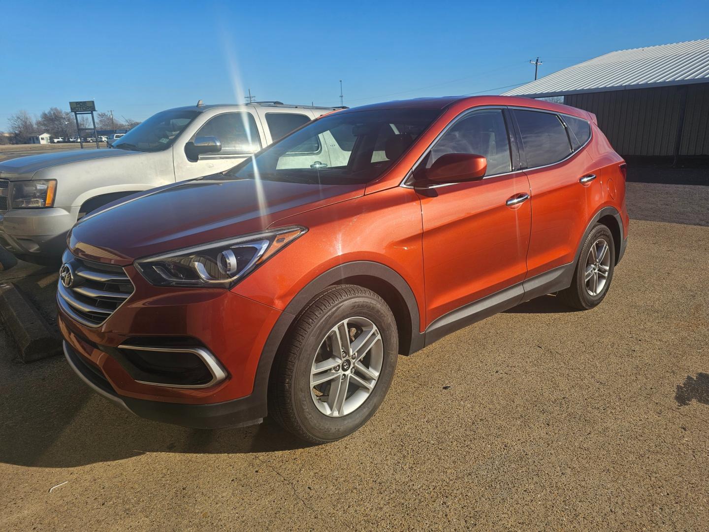 2017 ORANGE Hyundai Santa Fe Sport 2.4 FWD (5XYZT3LB6HG) with an 2.4L L4 DOHC 16V engine, 6A transmission, located at 533 S Seven Points BLVD, Seven Points, TX, 75143, (430) 255-4030, 32.313999, -96.209351 - Photo#0